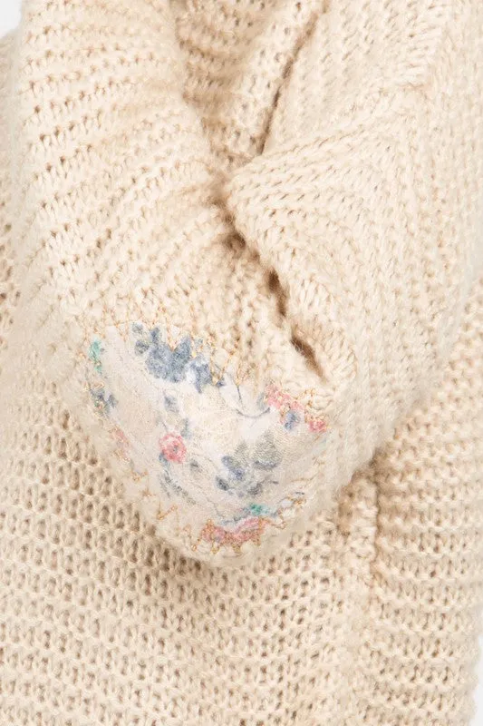 Basic ribbed pullover sweater with multi-colored floral elbow patch